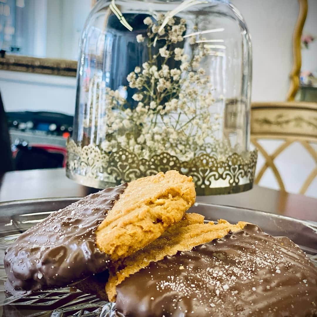 Close-up of chocolate-dipped cookies on a serving tray